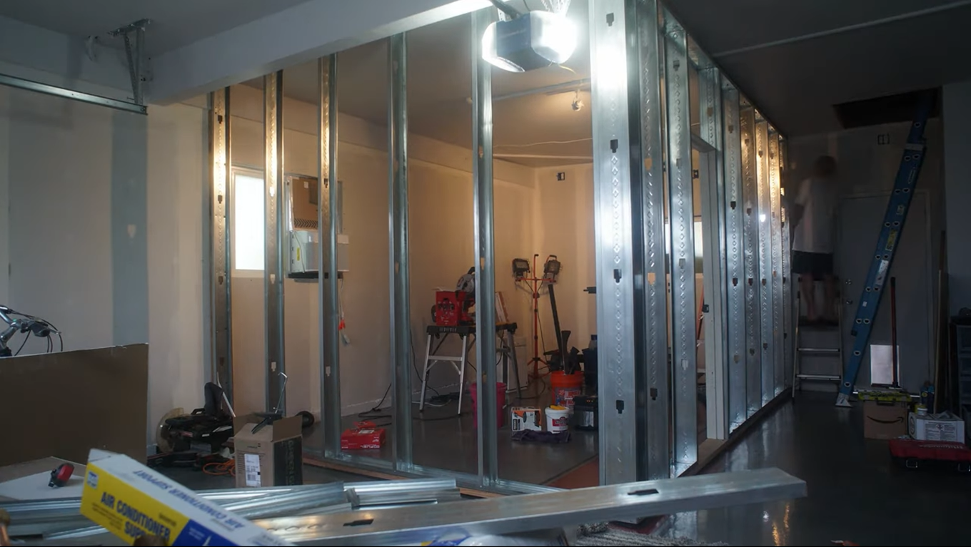 Studio build in progress — metal-stud framing for a new sound room